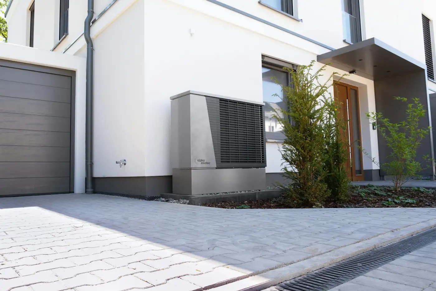 Modern house exterior with heat pump unit