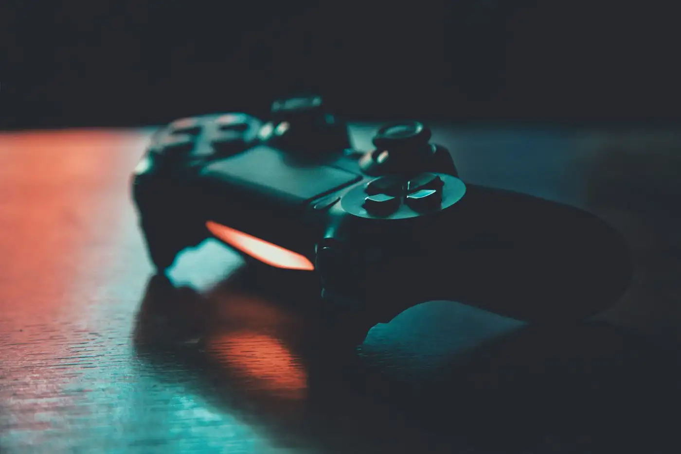 Game controller on wooden surface