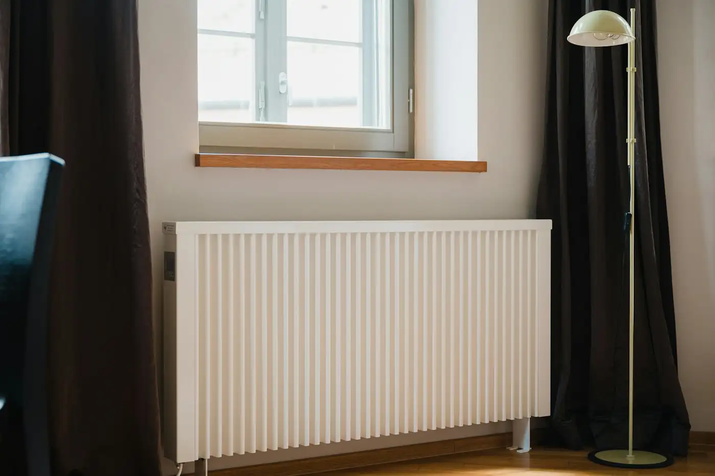 A white radiator in a room