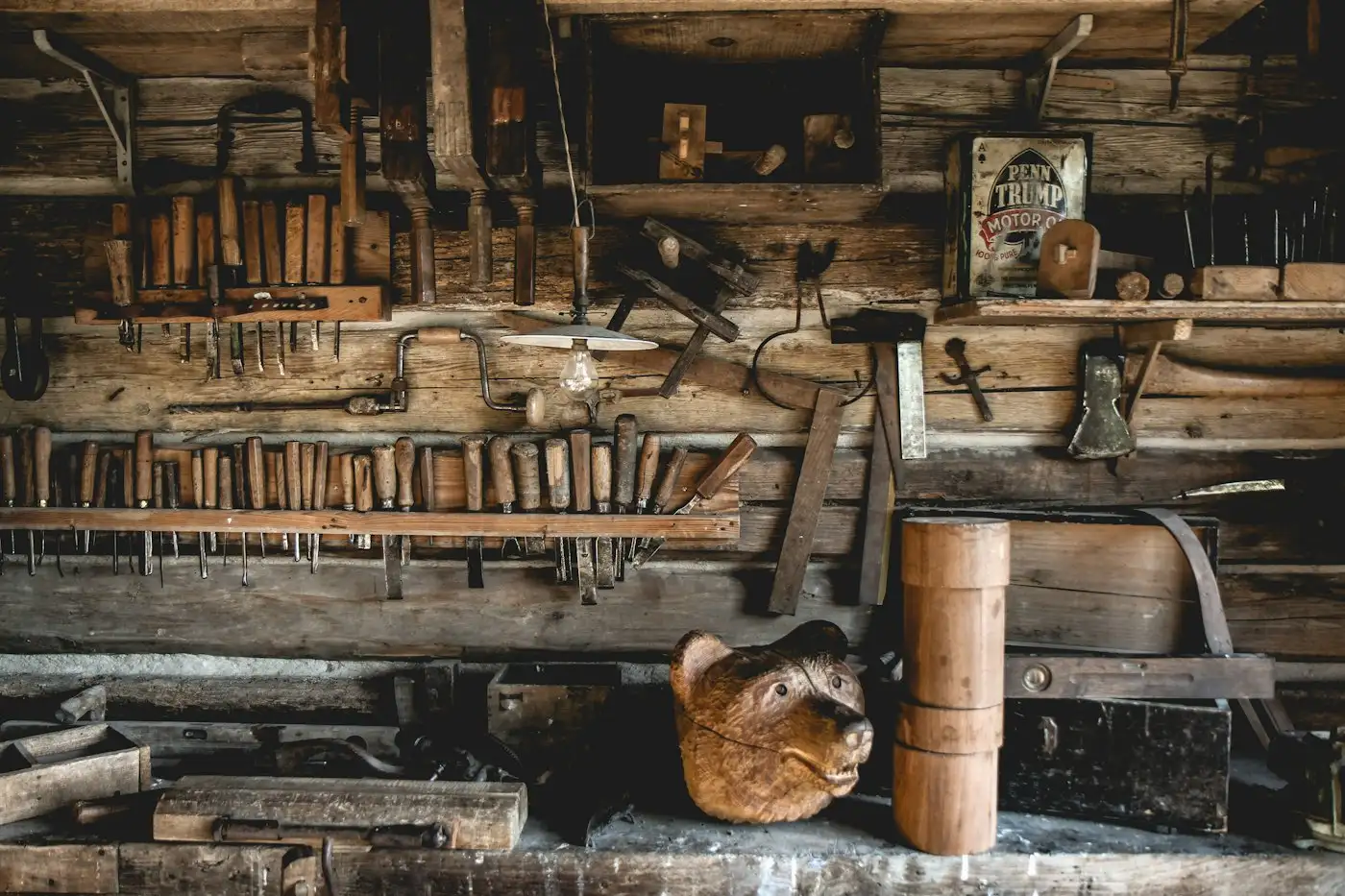 A bunch of tools hanging on a wall