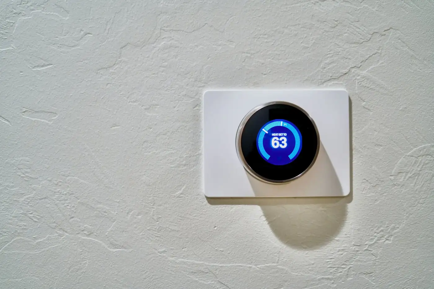 White thermostat at 62
