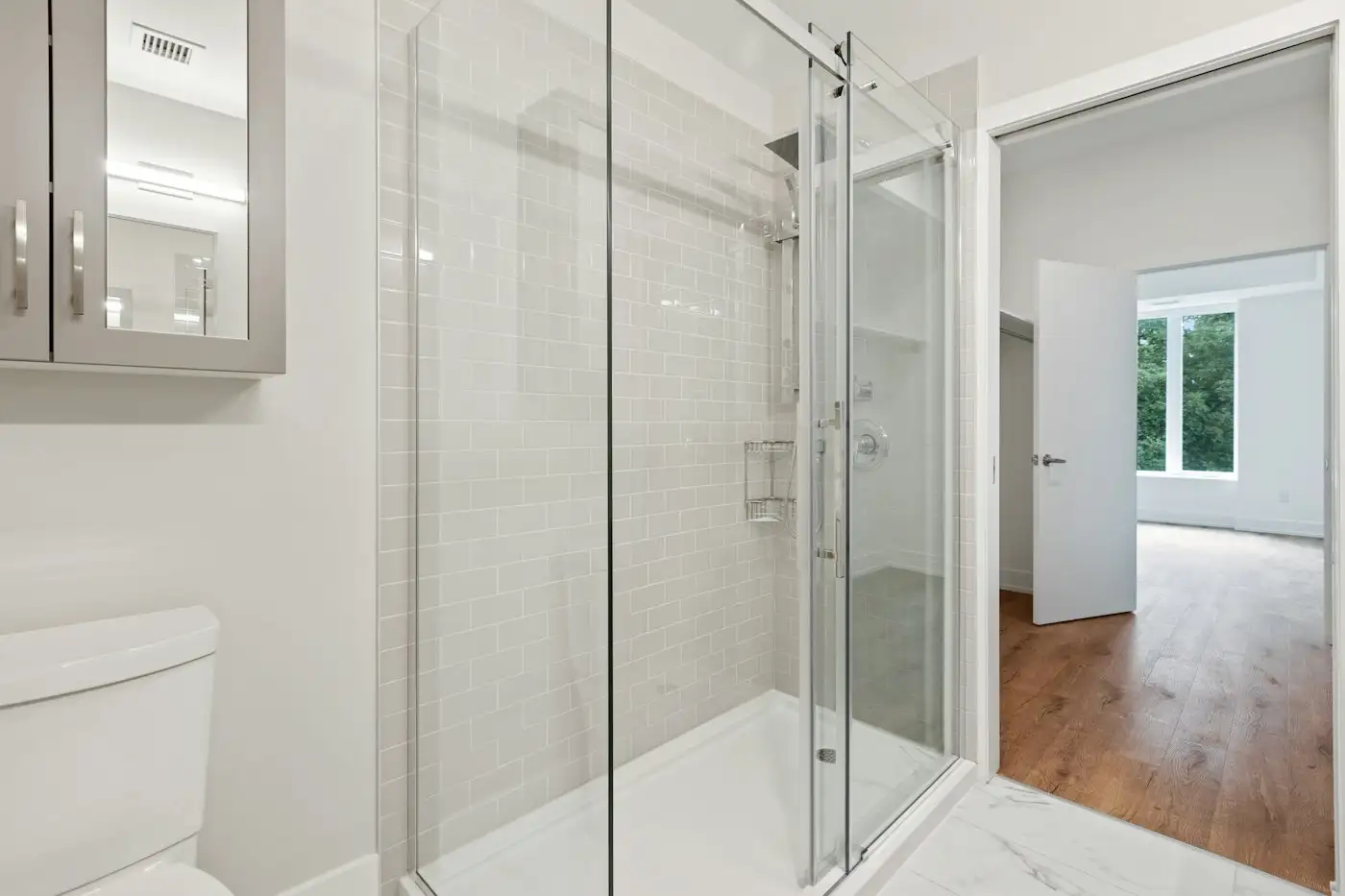 Clear glass door with white frame