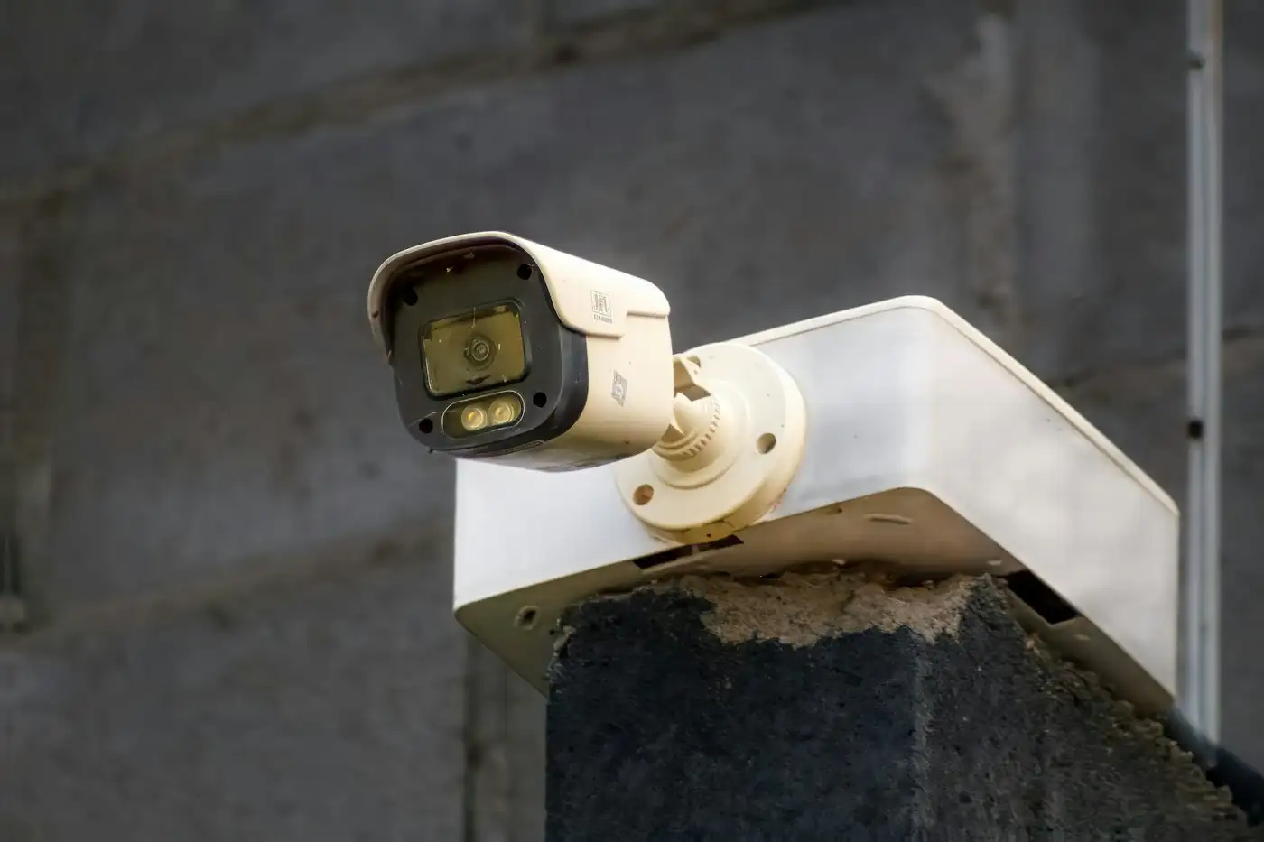 A security camera mounted on a wall
