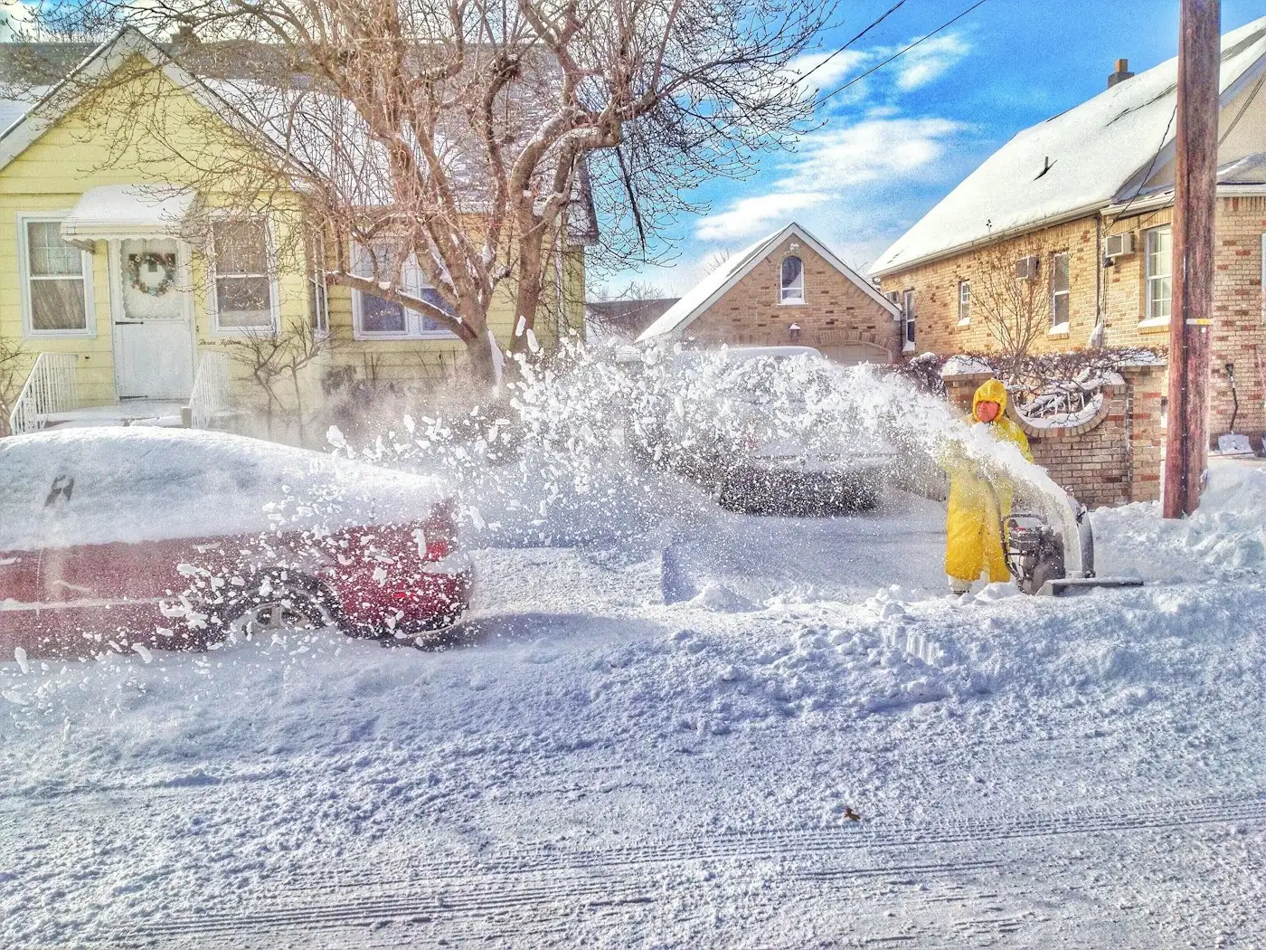 Man using snow thrower
